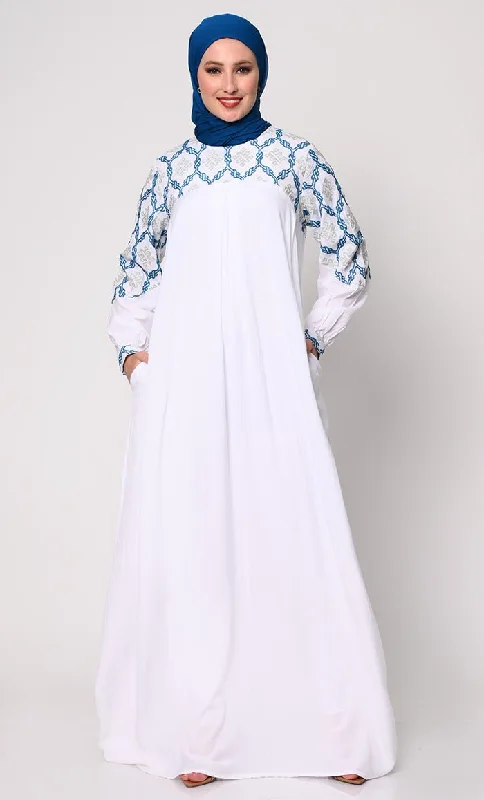 Elegant Simplicity: Embroidered White Abaya with Box Pleats and Dual Pockets